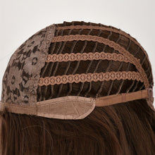 Shoulder-length with A Water Wave Style. It Has Brown Highlights. The Roots Of The Hair Are Brown And The Middle