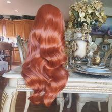 Copper Ginger Orange with Loose Waves Featuring a 13X4 HD Body Wave