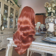 Copper Ginger Orange with Loose Waves Featuring a 13X4 HD Body Wave